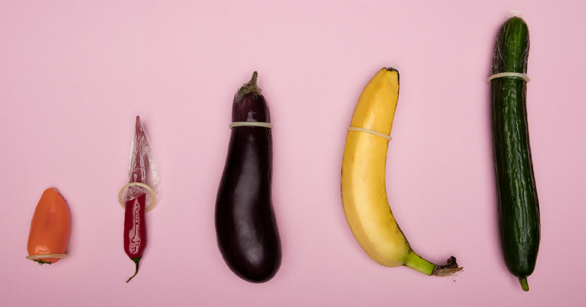 Vegetables with condoms arranged by size to highlight safe intimacy for Mutual Climax